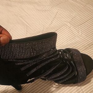 silver and black shoes